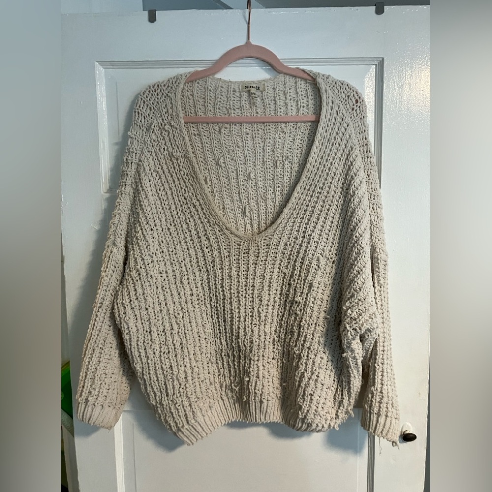 Miracle Ivory sweater knit. Oversized and looks great with jeans and boots.